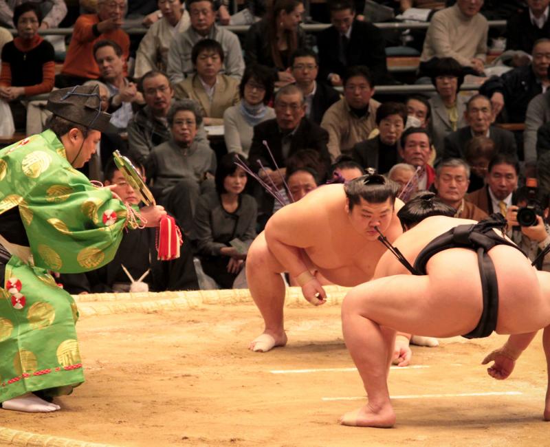 Sumo tournament in Osaka, Wrestlers preparing for a bout 4 Sumo tournament in Osaka, Wrestlers preparing for a bout 4