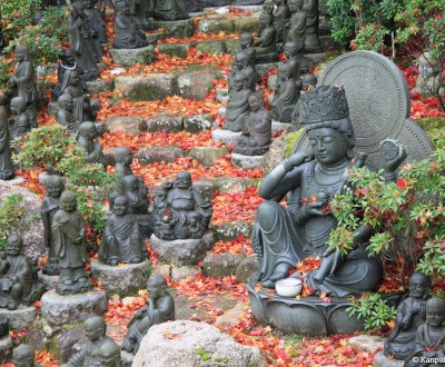 Daisho-in Temple (Miyajima), Buddhist statues laden stairway covered in red maple tree leaves in autumn 