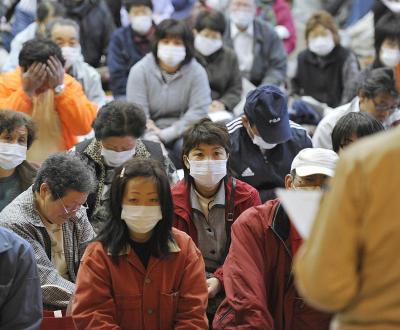 © Kyodo News (April 2011), Iitate's inhabitants gathered before their evacuation