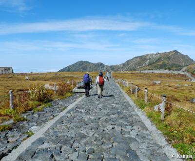 Murodo, Cobblestone hiking path on the plateau and bus station on the left