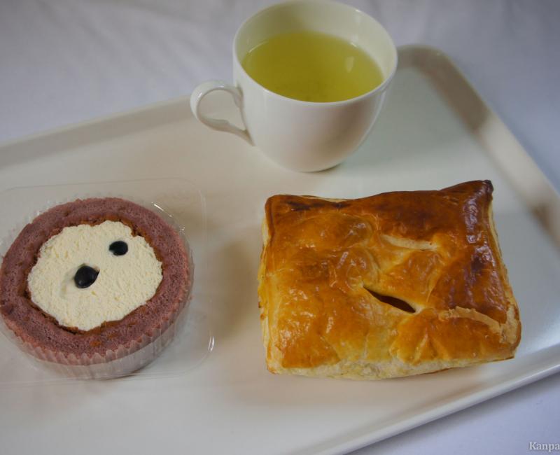 Konbini, Sweet breakfast with green tea, apple pastrie and blueberry rollcake Konbini, Sweet breakfast with green tea, apple pastrie and blueberry rollcake