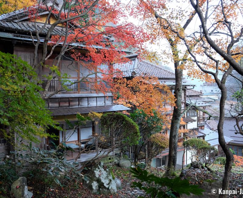 Higashiyama Onsen Mukaitaki, View on the traditional ryokan from the garden in autumn Higashiyama Onsen Mukaitaki, View on the traditional ryokan from the garden in autumn