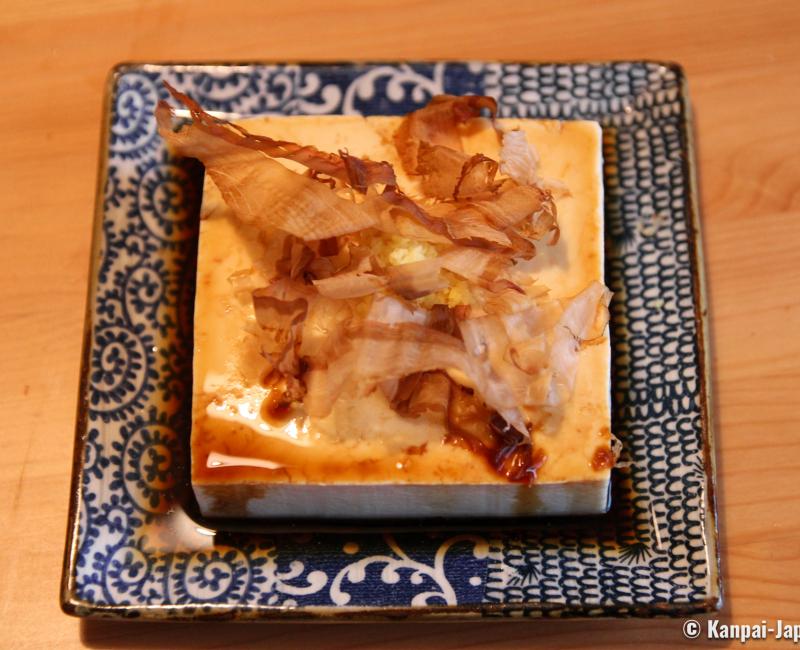 Hiyayakko cold tofu dish topped with katsuobushi flakes