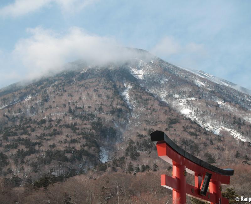 Okunikko, Mount Nantai and Shinto torii gate in winter Okunikko, Mount Nantai and Shinto torii gate in winter