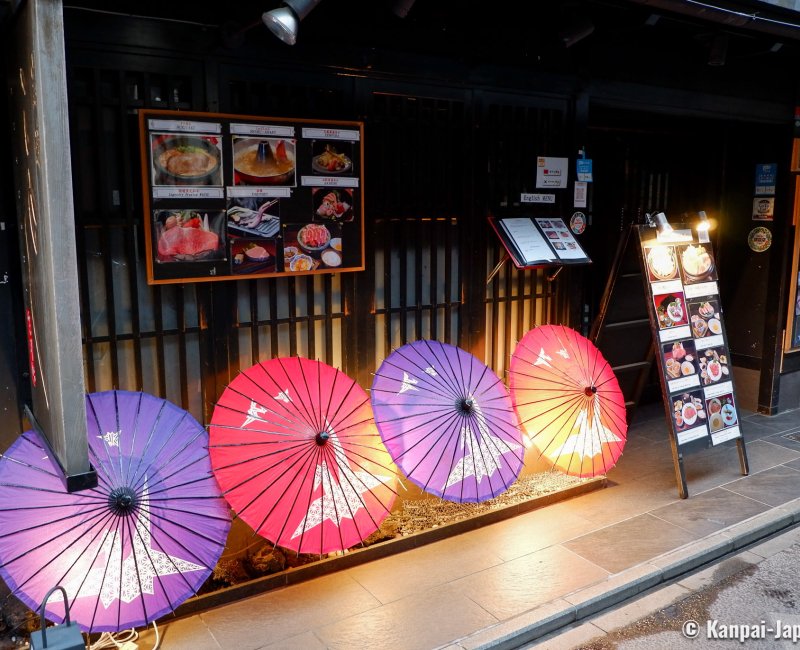 Pontocho (Kyoto), Japanese umbrellas light-up in front of a grilled meat restaurant
