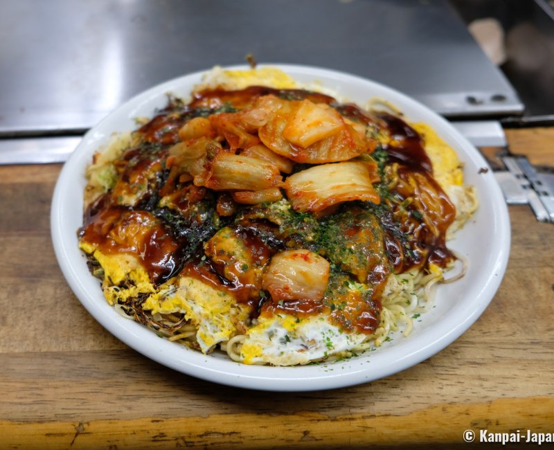 Okonomimura, Hiroshima-style okonomiyaki with added kimchi cabbage Okonomimura, Hiroshima-style okonomiyaki with added kimchi cabbage
