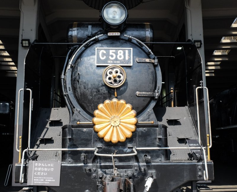 Kyoto Railway Museum, Chrysanthemum imperial coat of arm on an old locomotive Kyoto Railway Museum, Chrysanthemum imperial coat of arm on an old locomotive