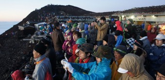 Hikers at the top of Mount Fuji