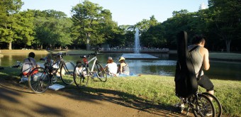 Yoyogi Park in Tokyo, People enjoying the shade of trees and pond in summer 3