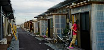 © T. MUNITA/The New York Times-REDUX-REA, Kasetsu jûtaku temporary housing for Fukushima refugees in Minami-soma