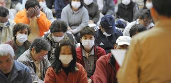 © Kyodo News (April 2011), Iitate's inhabitants gathered before their evacuation