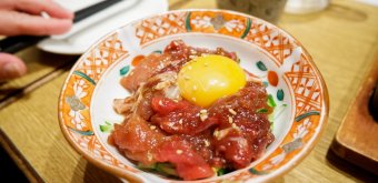 Slices of raw red tuna to share at a Tokyo izakaya pub