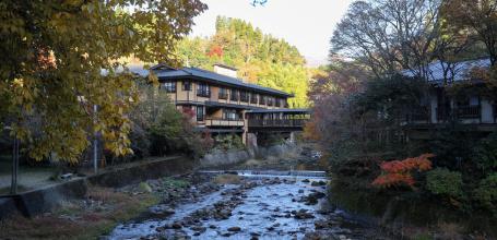 Kurokawa Onsen, View on the hot springs village in autumn
