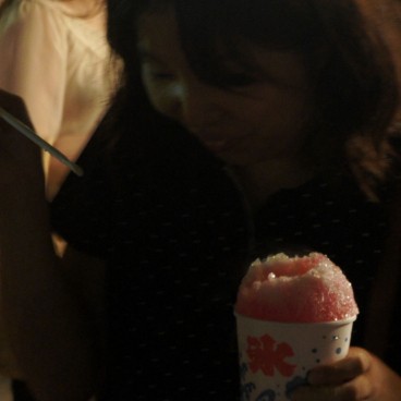 Tenjin Matsuri in Osaka, Festival goer easting a Kakigori ice