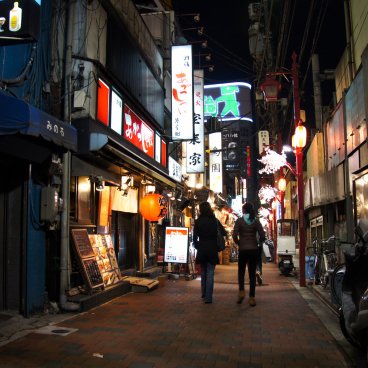 Tokyo alley with bars and restaurants at night