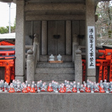 Fushimi Inari Taisha in Kyoto, Altar with torii gates and numerous Kitsune fox statues