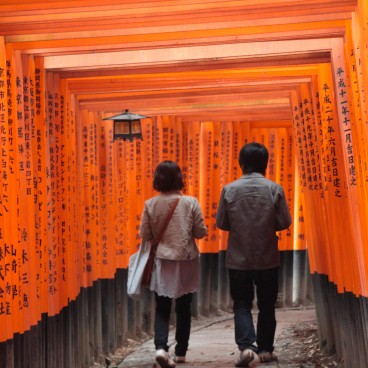 Fushimi Inari Taisha in Kyoto, A couple walking the corridor of torii gates