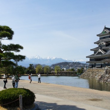 Matsumoto Castle, View on the black keep and the Japanese Alps