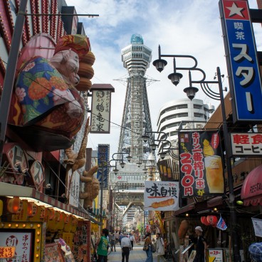 Tsutenkaku Tower, typical shops and restaurants in Shinsekai district in Osaka