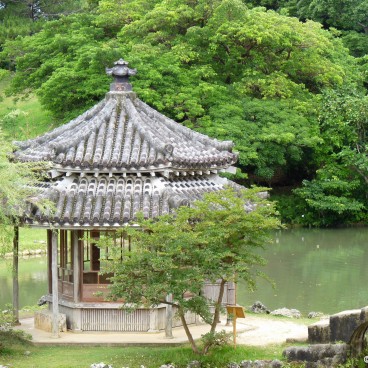 Shikina-en garden in Okinawa, View on the pond and the Rokkaku-do hexagonal pavilion
