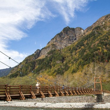 Kamikochi, Suspended bridge and mountains in autumn