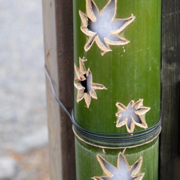 To-ji in Kyoto, bamboo pole ornamented with a maple tree leaf pattern