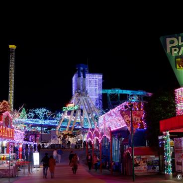 Yomiuriland Amusement Park, main alley illuminated