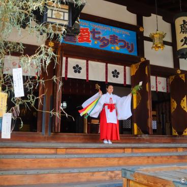 Tenmangu shrine in Osaka, Miko performing a ceremony for Tanabata festival