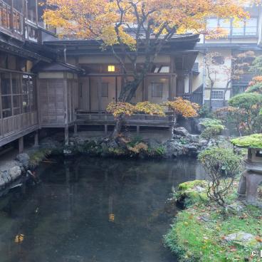 Higashiyama Onsen Mukaitaki, View on the traditional ryokan from the garden in autumn 3