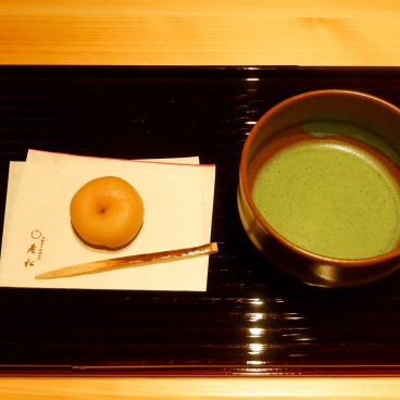 Matcha tea and traditional pastry at Suigian