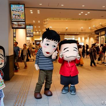 Sennichimae Doguyasuji, Surrounding neighborhood, Yoshimoto's characters in front of Namba Grand Kagetsu comedy theater