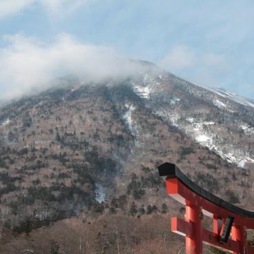 Okunikko, Mount Nantai and Shinto torii gate in winter