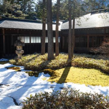 Tamozawa Imperial Villa Memorial Park in Nikko, View on the garden and the buildings in winter