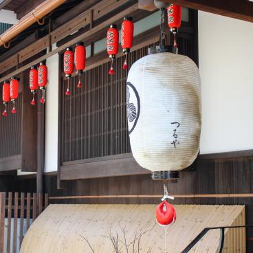 Naramachi District in Nara, Lanterns and fabric monkey dolls at Ganri-in