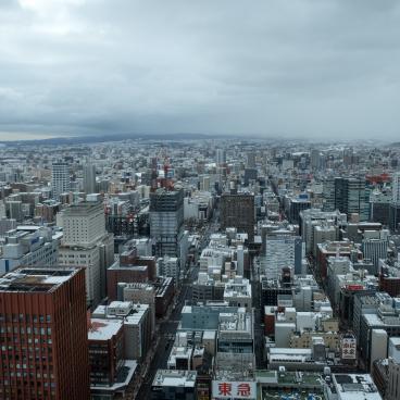 JR Tower T38 in Sapporo, View on the mountains and the city in winter