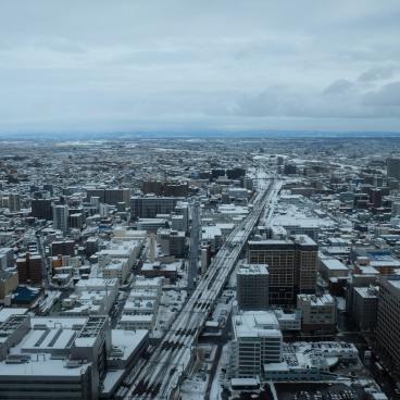 JR Tower T38 in Sapporo, View on the mountains and the city in winter 2