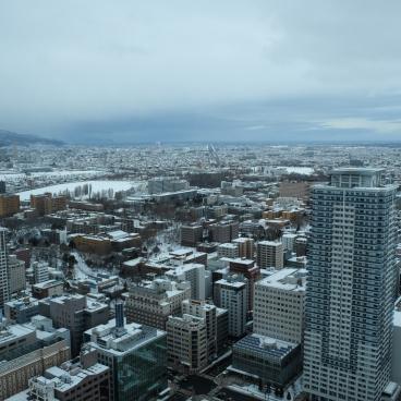 JR Tower T38 in Sapporo, View on the city and Ishikari Bay in the horizon in winter