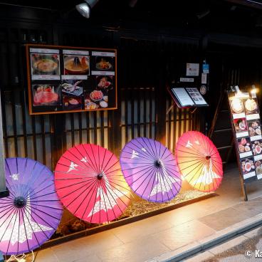 Pontocho (Kyoto), Japanese umbrellas light-up in front of a grilled meat restaurant