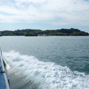 Inujima, View on the island's coast from the ferry 2