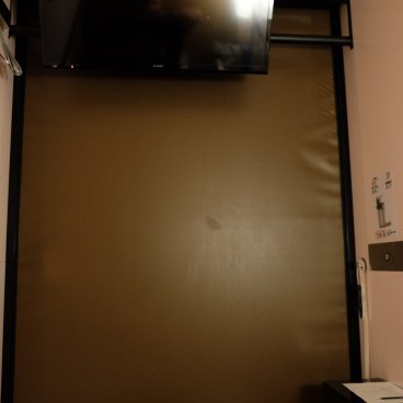 First Cabin Kansai Airport (Osaka), View from a Business Class Cabin room on the TV and closed curtain