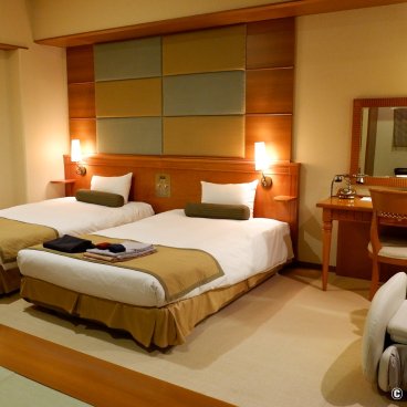 Wakura Onsen, Western-style bedding in a suite of the ryokan inn Notoraku