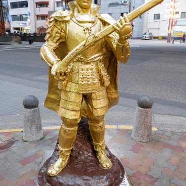 Statue of Oda Nobunaga holding a firearm in a street of Nagoya
