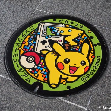Nintendo Museum (Uji), Nintendo-themed manhole featuring Pokemon in front of the museum