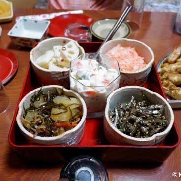Osechi Ryori, Traditional dishes on a tray: Kazunoko, Tazukuri, Daikon radish, Kohaku Namasu