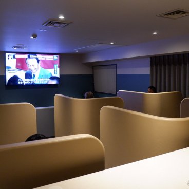 Capsule Inn Osaka (Umeda), TV lounge with single-seater armchairs