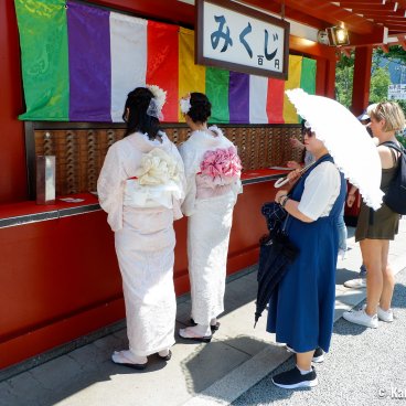Summer Heat in Japan, Visitors wearing yukata and using an umbrella in Asakusa, Tokyo
