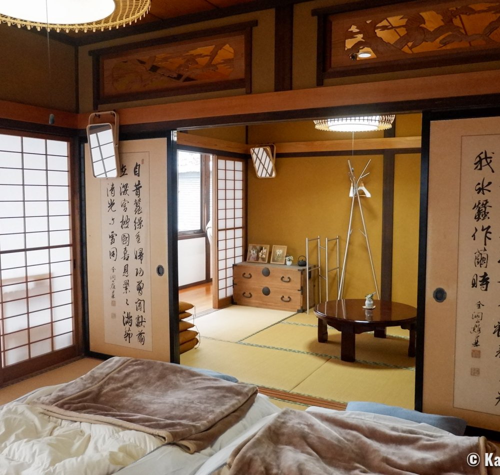 Entrance of Enishi residence in Kakunodate with two Akita-dogs