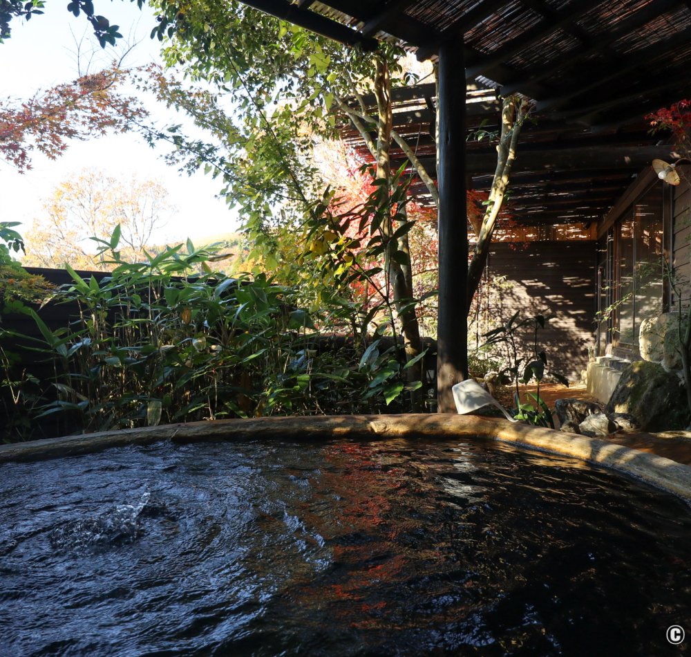 Kurokawa Onsen, View on the hot springs village in autumn