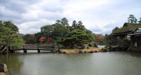 Hikone, View on the keep from one of the gardens in autumn